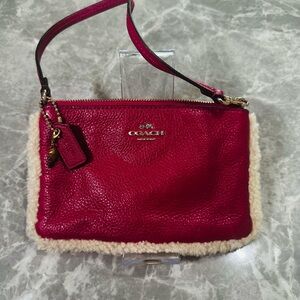 COACH Nolita Shearling Leather Wristlet Clutch Dark Pink Pebbled Fuschia
